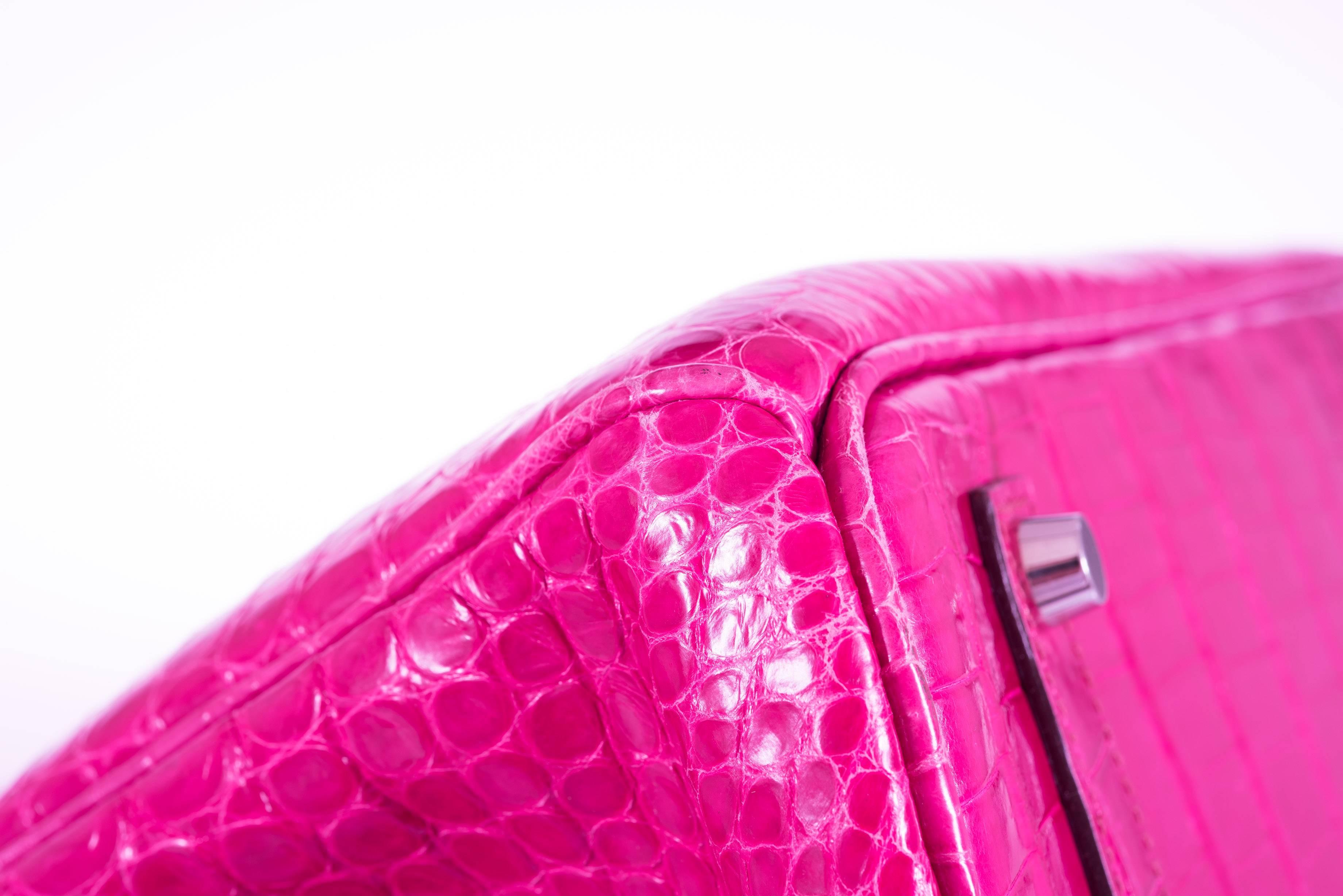 Hermes Birkin 35cm Crocodile Pink Fuchsia Palladium Hardware 

JaneFinds Baginizer, a must have and included with your purchase.

This bag is simply stunning, complete your feminine look with this beautiful Pink. A bold color that will brighten up