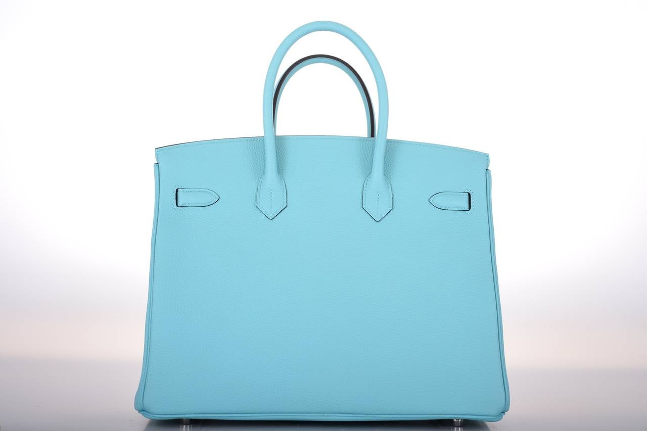 As always, another one of my fab finds! Hermes Birkin 35cm. 

New incredible new Tiffany color bleu atoll with palladium hardware.

JaneFinds Baginizer size 35 is a must in every Birkin bag and will be included with your purchase!

This bag is brand