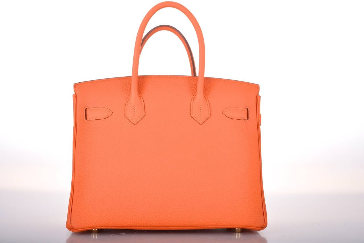 As always, another one of my fab finds! NEW INCREDIBLE Hermes BIRKIN BAG 3ocm ORANGE WITH GOLD Hardware in beautiful togo leather.

This bag is brand new with original box and accessories.

**Note: Accessories used for JaneFinds photo shoots are