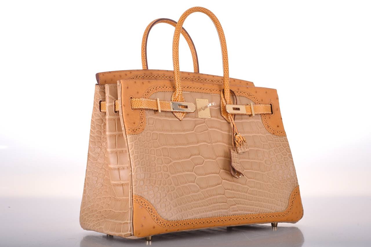 As always, another one of my fab finds! True collector's piece. SUPER RARE, ONLY OFFERED TO VIP CLIENTELE!  
Hermes 35cm GRAND MARRIAGE BIRKIN 35cm in Tri exotic combination. Stunning neutral colors in the most beautiful combination with Permabrass