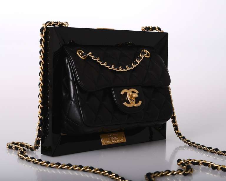 LIMITED EDITION CHANEL FRAME BAG PLEXIGLASS & GOLD. THIS BAG WAS ONLY OFFERED TO VIP CLIENTELE.

SEEN ON FABULOUS MIRA DUMA. GORGEOUS LAMBSKIN, 2 BAGS IN ONE! COMES COMPLETE WITH BOX, DUST BAG, AND AUTHENTICITY CARD. THE FRAME OPENS TO A GORGEOUS