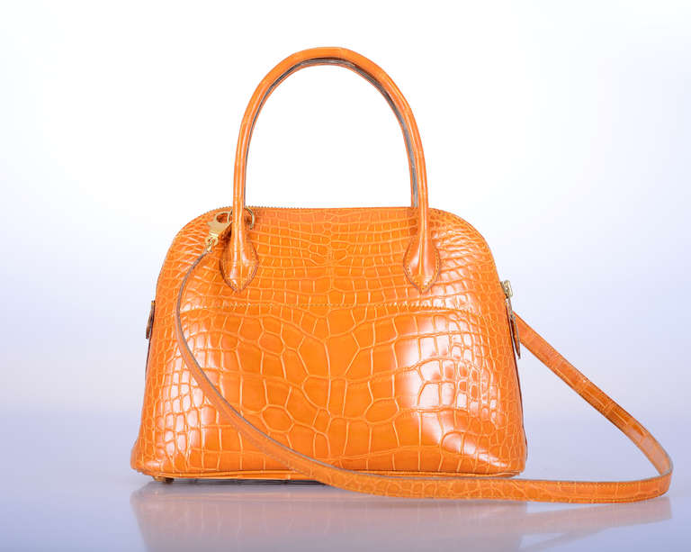 As always, another one of my fab finds! Hermes rare alligator BOLIDE bag in beautiful SAFFRON. Lined with chevre leather & GOLD hardware.

This bag is pre-loved PRISTINE CONDITION! The bag comes with a sleeper and cites.