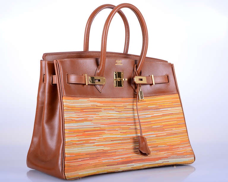 Hermes 35cm BIRKIN BAG VIBRATO (VERTICAL PATTERN OF DYED MOUNTAIN GOAT SKIN FOLDED IN MULTIPLE LAYERS AND CUT). CURRENTLY discontinued gorgeous noisette color with STUNNING GOLD HARDWARE.
                                                      
YOU