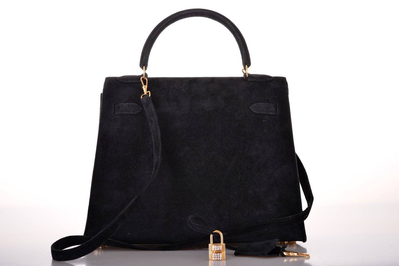 As always, another one of my fab finds!

Unique Special Order by Director of Hermes - only ONE piece in the world!

Hermes K25 Sellier black suede leather Ghw  I stamp DIAMONDS - AMAZING DEAL!

Worth €138000

The bag is like new!