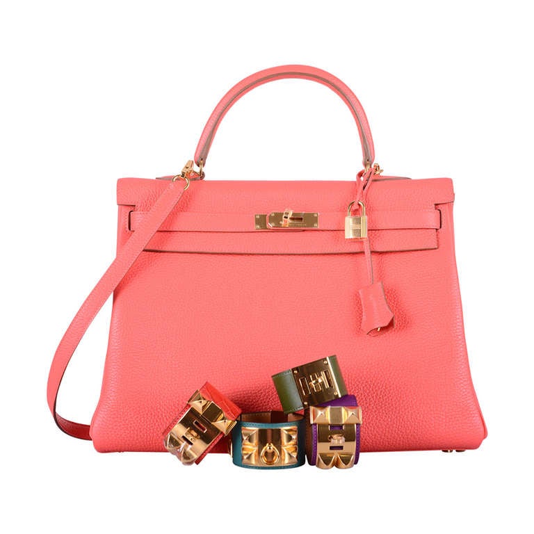 As always, another one of my fab finds! Hermes 35cm KELLY for NEW ROSE JAIPUR gorgeous bright PINK with GOLD hardware. TOGO leather.
MY CAMERA TAKES ACCURATE PICTURES, BUT THE COLOR IS REALLY SUPER! CRAZY PINK! IT'S TRULY SOMETHING SPECIAL!

This