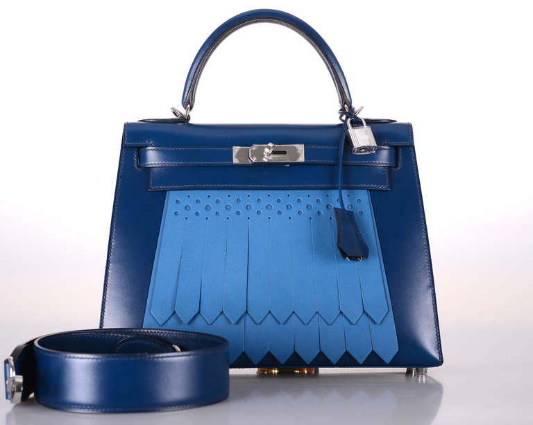 As always, another one of my fab finds! True collector's piece. SUPER RARE, ONLY OFFERED TO VIP CLIENTELE!  
Hermes 28cm KELLY SELLIER GOLF BOX & SWIFT LEATHER! 
GORGEOUS BLUE COLORS: BLUE DE PRUSSE & BLUE DE GALICE WITH PALLADIUM hardware.
This