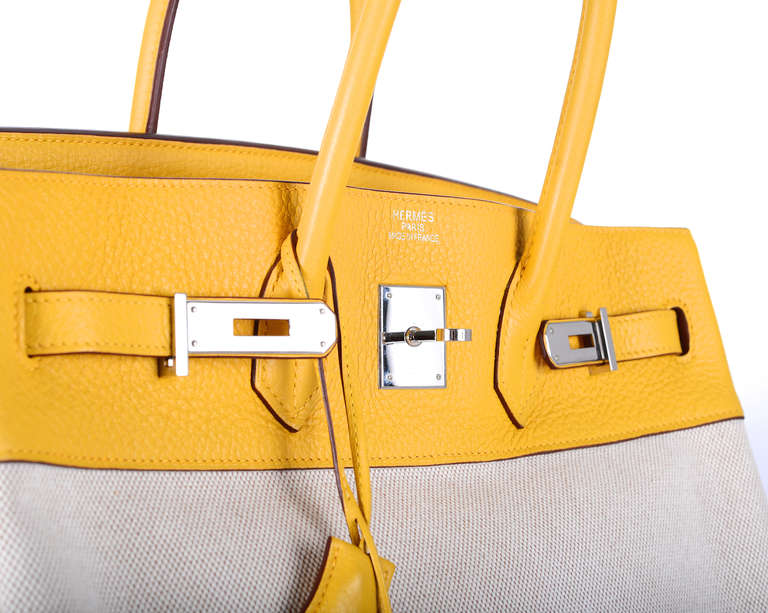 As always, another one of my fab finds! The Hermes 35cm Birkin Bag in beautiful SOLEIL SUNSHINE YELLOW TOILE 2 TONE COMBINATION with PALLADIUM HARDWARE 

This bag comes with lock, keys, clochette, a sleeper for the bag, and BOX.
THE BAG IS LOVED,