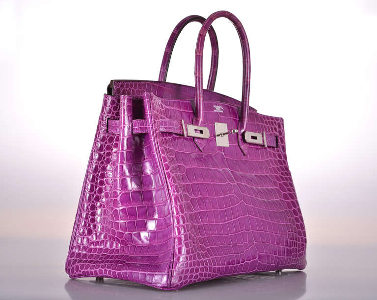 As always, another one of my fab finds! The sexiest bag ever… Hermes 35cm Birkin in beautiful VIOLET POROSUS CROCODILE with stunning palladium hardware.

This bag comes with lock, keys, clochette, a sleeper for the bag, rain protector, box and