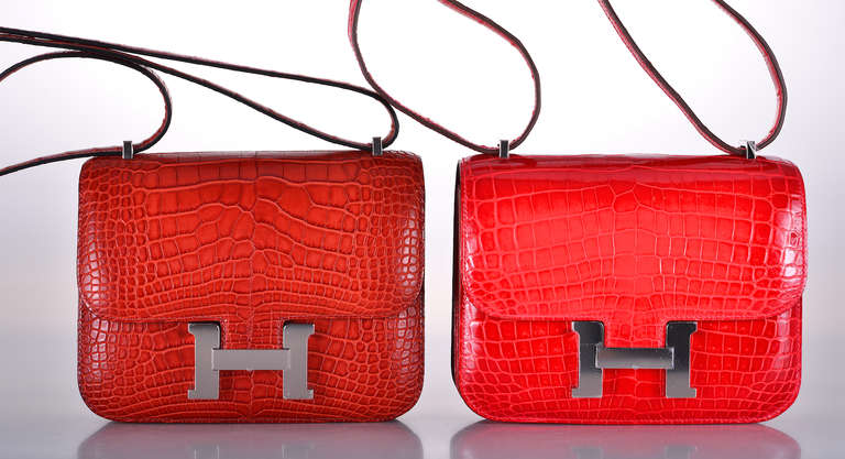 As always, another one of my fab finds! Hermes Constance in ALLIGATOR! A PERFECT size 18cm! Very rare FIND in the ROUGE H WITH PALLADIUM HARDWARE AND EXTRA BACK POCKET with a comfy double strap that is perfect to carry cross body! 

Measurements: