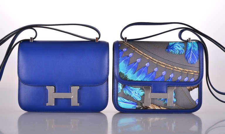 As always, another one of my fab finds! Hermes 18cm
HERMES 2014 HERMES CONSTANCE III MINI SOIE BRAZIL GRAPHITE & BLEU SAPPHIRE with a comfy longer strap that is perfect on the shoulder and cross body wear!

This bag is brand new with original box