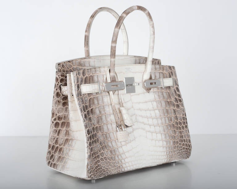 AS ALWAYS, ANOTHER ONE OF MY INSANE HERMES FINDS!

Not your ordinary croc BIRKIN, this is very special and only offered to “elite” clientele. 

Additional pictures will be provided if needed. Please contact me with any questions.

HERMES