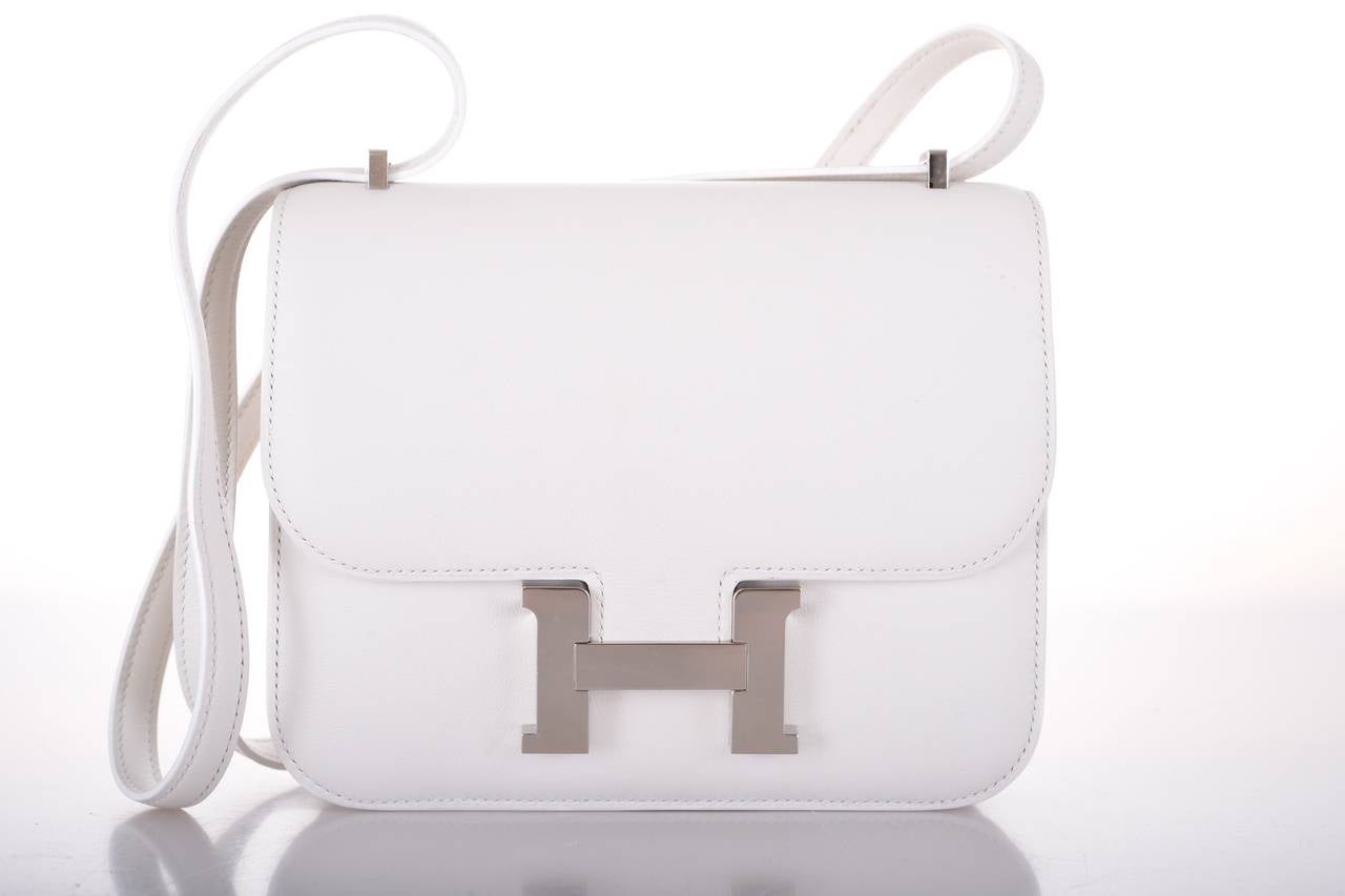 As always, another one of my fab finds! Hermes WHITE Constance 18cm. Comfy longer strap that is perfect to carry cross body. Absolutely my fave bag! Leaves hands free to shop!

Beautiful  SWIFT leather with gorgeous PALLADIUM hardware.

This bag