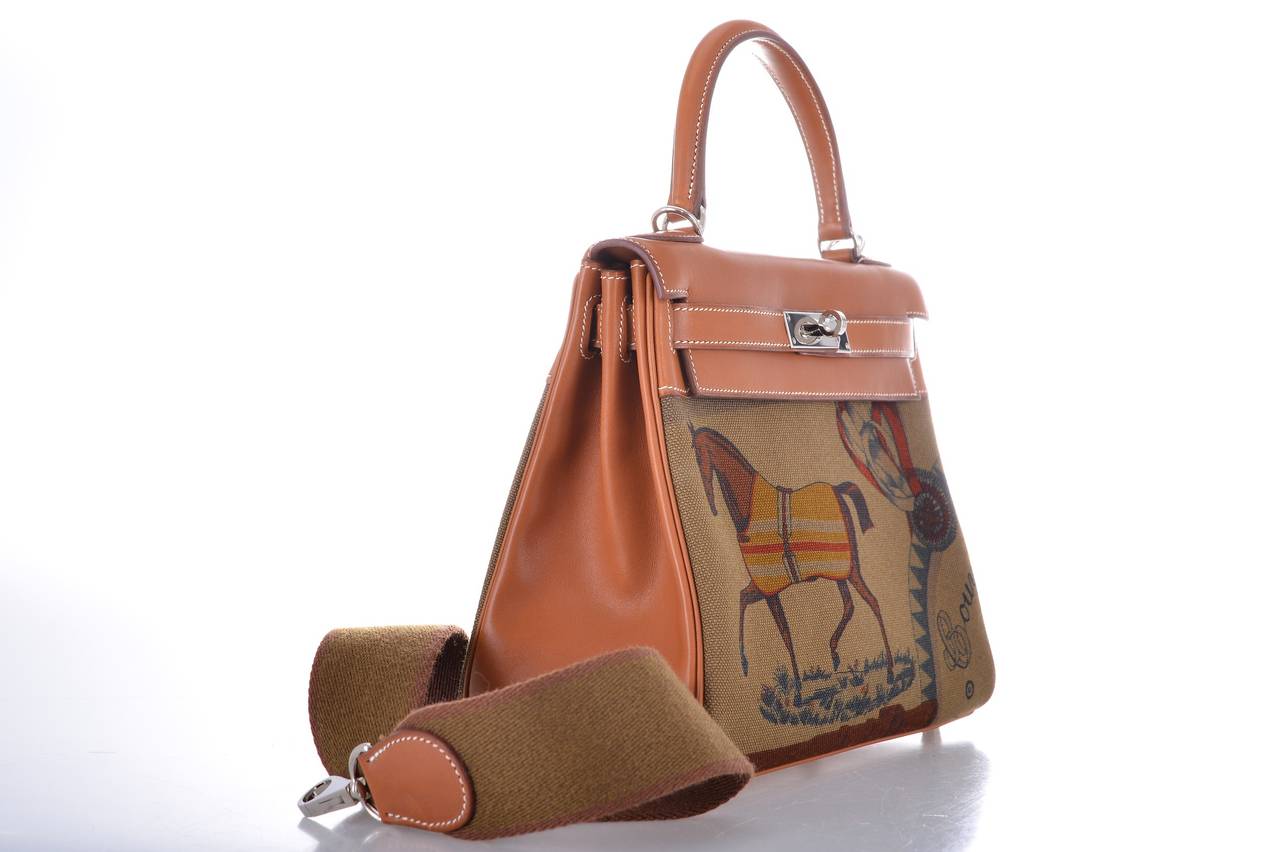 As always, another one of my fab finds! SUPER RARE Hermes 28cm AMAZONE KELLY WITH AN AMAZING THICK SHOULDER STRAP & palladium hardware.
SPECIAL EDITION FAUVE BARENIA WITH GORGEOUS TOILE HORSE PRINT 

This bag is brand new with original box and