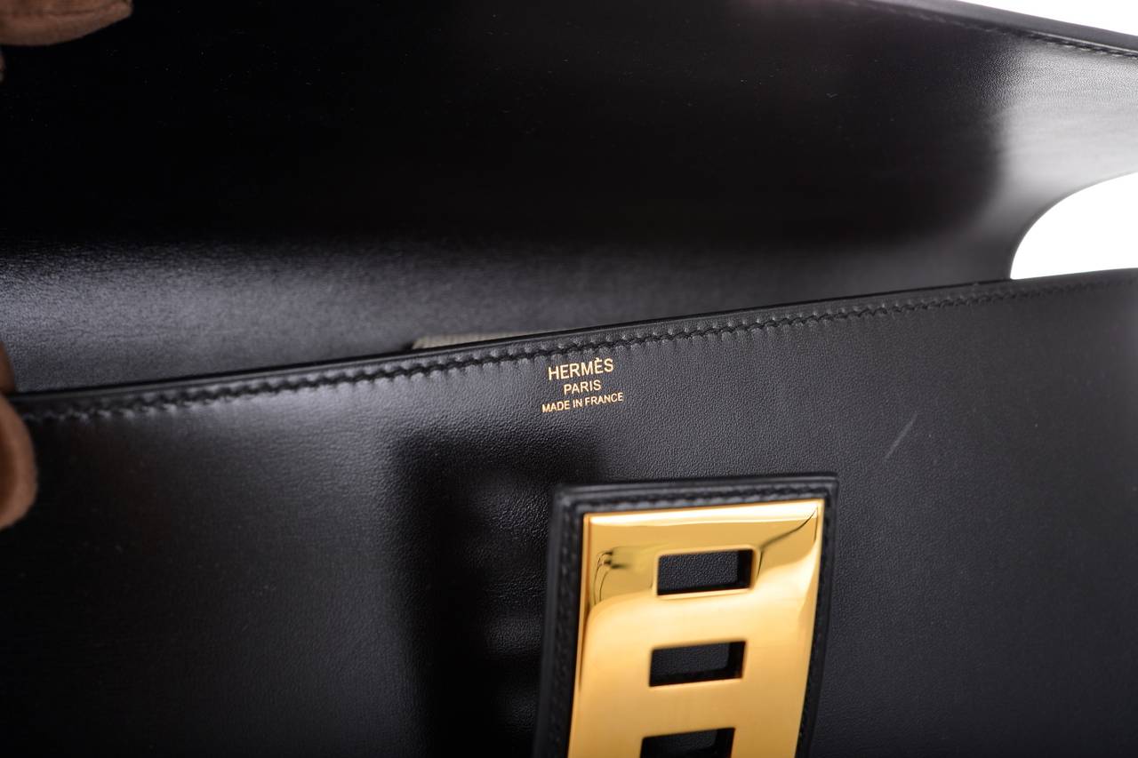 hermes black medor pochette 23cm clutch gold hardware bag elegant  