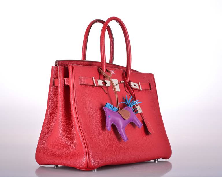 As always, another one of my fab finds! Hermes 35cm Birkin in beautiful IMPOSSIBLE TO GET ROUGE GARANCE! THE BRIGHTEST RED FROM HERMES with PALLADIUM hardware! TOGO leather!

This bag comes with lock, keys, clochette, a sleeper for the bag, and