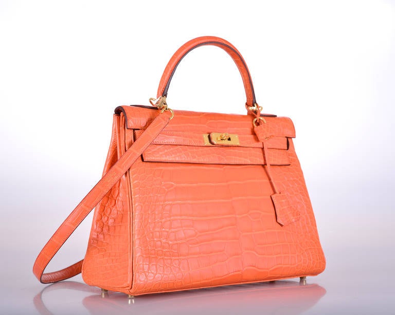HERMES KELLY 32CM FIRE ORANGE MATTE ALLIGATOR 

As always, another one of my fab finds! Hermes Kelly 32cm. The color is STUNNING BRIGHT ORANGE. Perfection as always with GOLD HARDWARE.
THIS BEAUTY IS BRAND NEW. JUST PURCHASED! THERE IS NEVER A