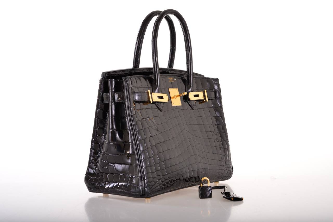 EXCLUSIVE offer! Hermes niloticus crocodile 30cm with gold hardware.

HERMES BIRKIN BAG BLACK WITH GOLD HARDWARE! The bag is in absolute mint condition.

 Pre-loved. Some plastic is still on the bag. COMES WITH A BOX AND ALL THE ACCESSORIES!