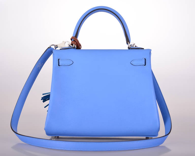 As always, another one of my fab finds!

Hermes 28cm KELLY  NEW COLOR BLUE PARADISE. TOGO LEATHER. PALLADIUM HARDWARE. 

This bag is brand new with original box and accessories.
THERE IS NO WAITING! NO ATTITUDE EVER! ENJOY! TREAT YOURSELF