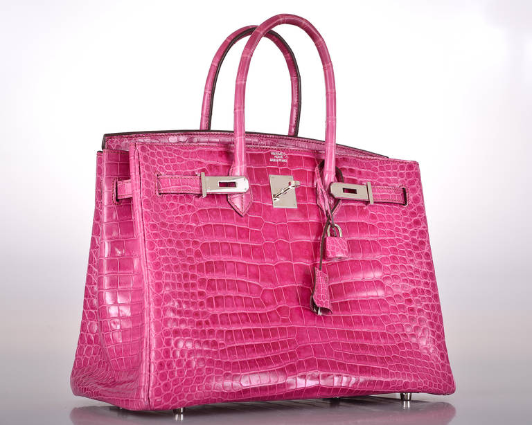 As always, another one of my fab finds! The sexiest bag ever… Hermes 35cm Birkin in beautiful ROSE TYRIEN POROSUS CROCODILE with stunning palladium hardware.

This bag comes with lock, keys, clochette, a sleeper for the bag, rain protector, box,
