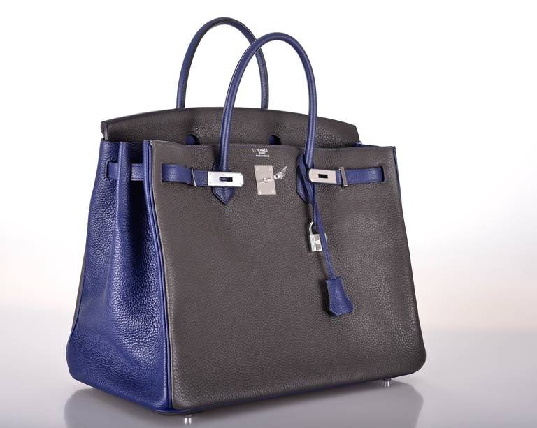 As always, another one of my fab finds! Hermes 40cm BIRKIN in beautiful 2 TONE COMBINATION GRAPHITE AND SAPPHIRE INTERIOR. PALLADIUM HARDWARE. A TRUE FIND! STUNNING COLOR COMBINATION. CLASSIC COLORS WITH A TWIST! A TRUE FASHIONISTA SHLEPPER