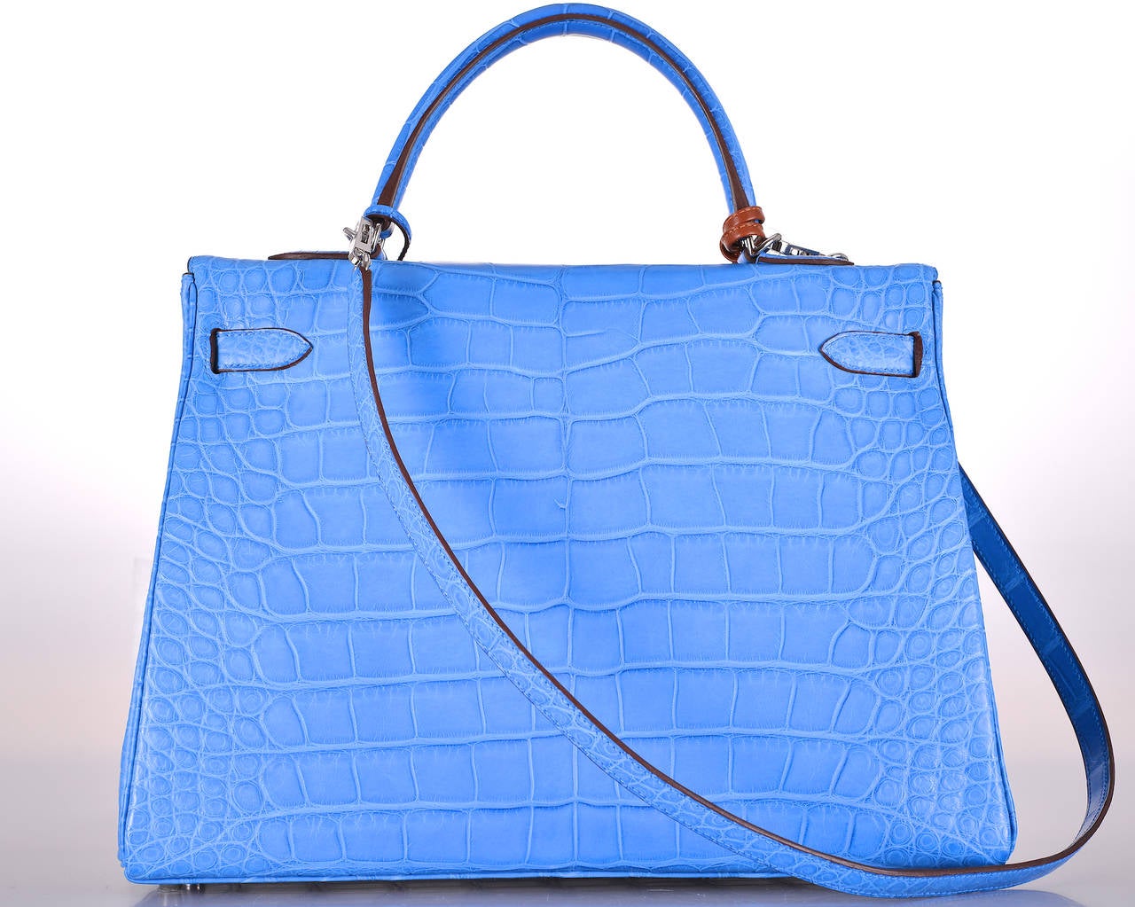 HERMES KELLY 35CM MYKONOS MATTE ALLIGATOR

As always, another one of my fab finds! Hermes Kelly 35cm. The color is STUNNING MYKONOS. Perfection as always, with palladium hardware.
THIS BEAUTY IS BRAND NEW! JUST PURCHASED!

THERE IS NEVER A