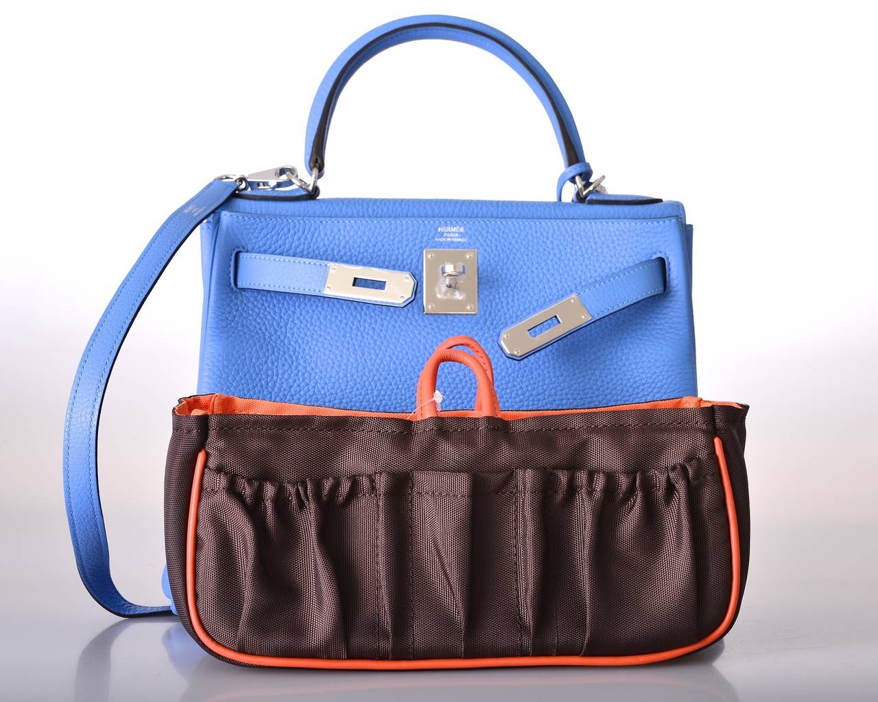 As always, another one of my fab finds!
Hermes 28cm KELLY  NEW COLOR BLUE PARADISE TOGO LEATHER! PALLADIUM HARDWARE.

This bag is brand new with original box and accessories.
THERE IS NO WAITING! NO ATTITUDE EVER! ENJOY! TREAT YOURSELF, BECAUSE