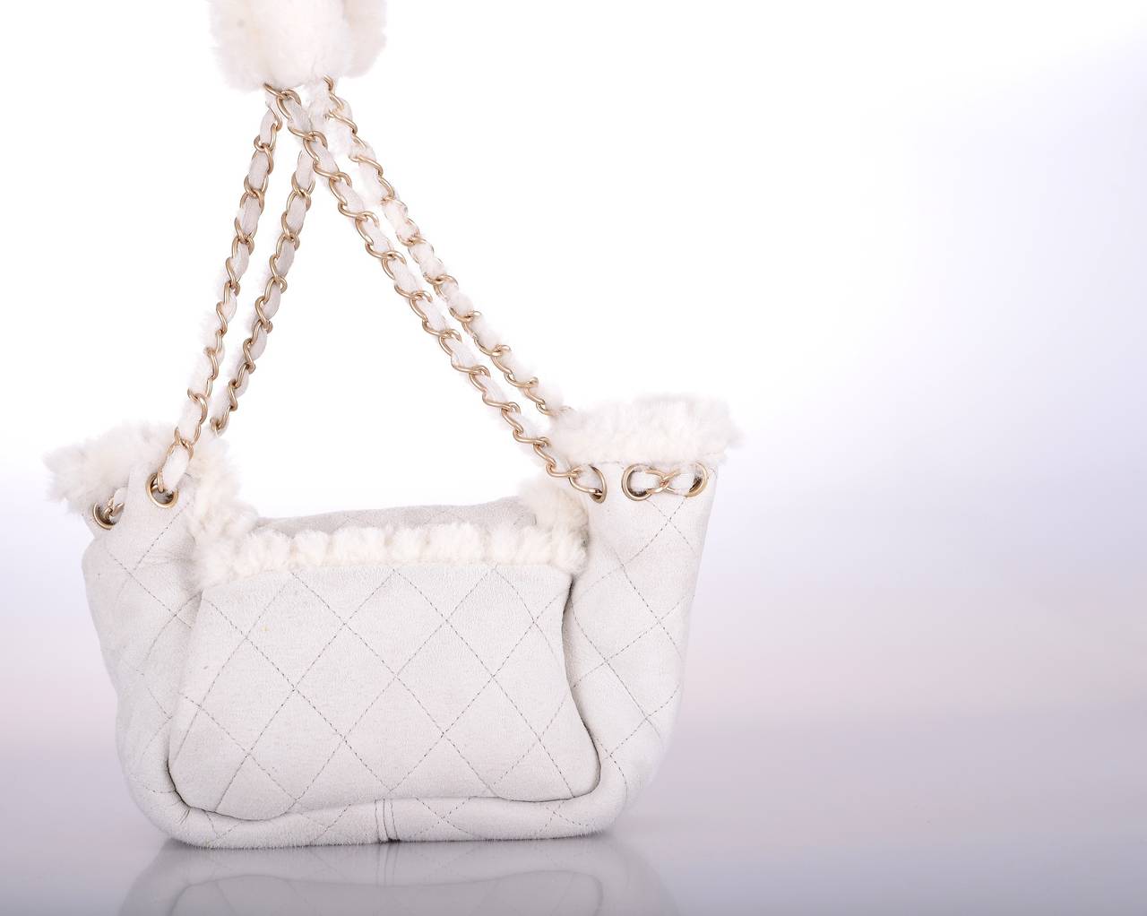 Chanel! STUNNING CLASSIC RUNWAY SHEARLING BAG WITH GOLD HARDWARE! THIS IS A LIMITED EDITION BAG.

THE MOST BEAUTIFUL CLASSIC WITH A TWIST! IMPOSSIBLE TO FIND. 

THE ULTIMATE BAG TO OWN! MAKE A STATEMENT WITHOUT SAYING A WORD…

THE BAG IS IN