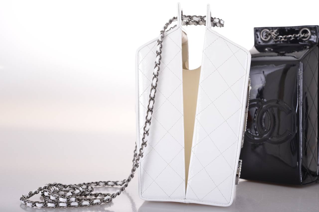 LIMITED EDITION CHANEL MILK CARTON! THE BEST THING EVER! EVEN FOR THE LACTOSE INTOLERANT GIRLS. :)

PERFECT CROSS BODY OR DOUBLE IT FOR A SHOULDER LOOK. WILL FIT ALL THE NECESSITIES.

THIS BAG WAS ONLY OFFERED TO VIP CLIENTELE. THE SPARKLE I