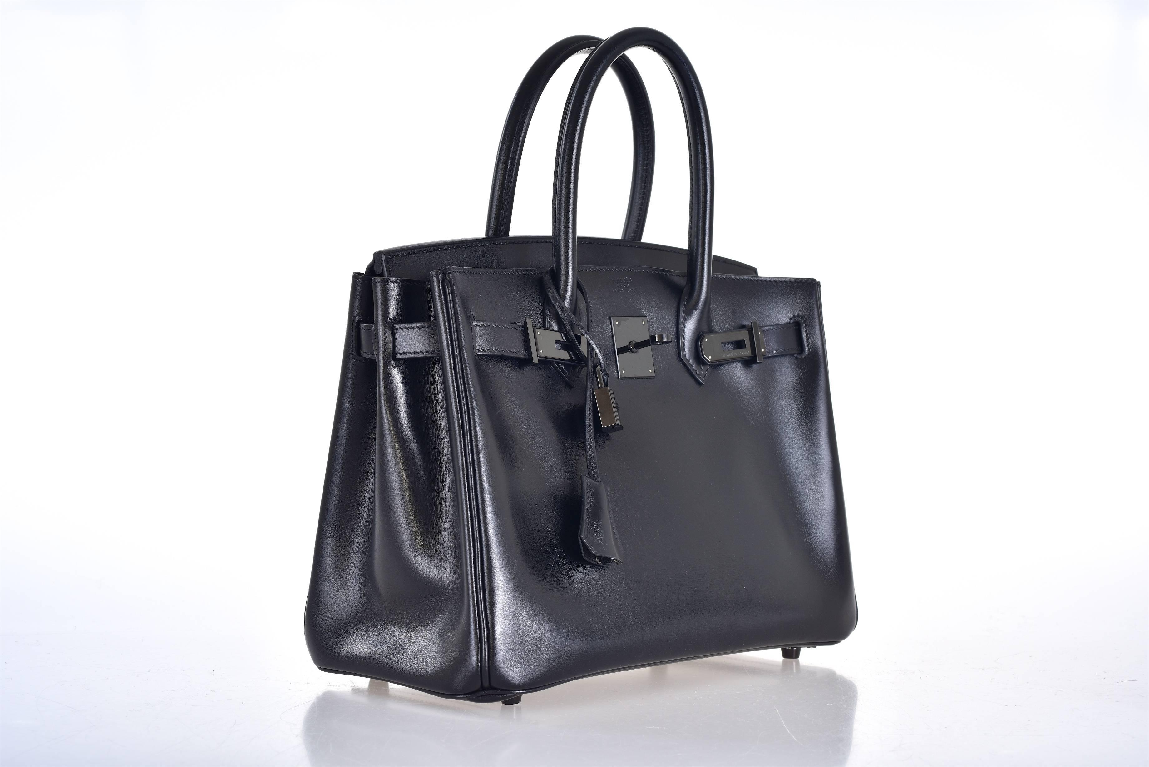 As always, another one of my fab finds! LIMITED Hermes 30cm SO BLACK box leather BIRKIN!
THIS BAG WILL TAKE YOUR BREATH AWAY! TRULY A MASTER PIECE!

This bag comes with lock, keys, clochette, a sleeper for the bag, and rain protector. No