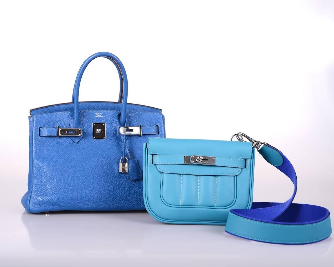 As always, another one of my fab finds! It has finally arrived... Hermes NEW Berline bag cross body. Beautiful NEW color Turquoise Blue Swift leather with palladium HARDWARE.

This bag comes with a sleeper removable strap, all the accessories, and