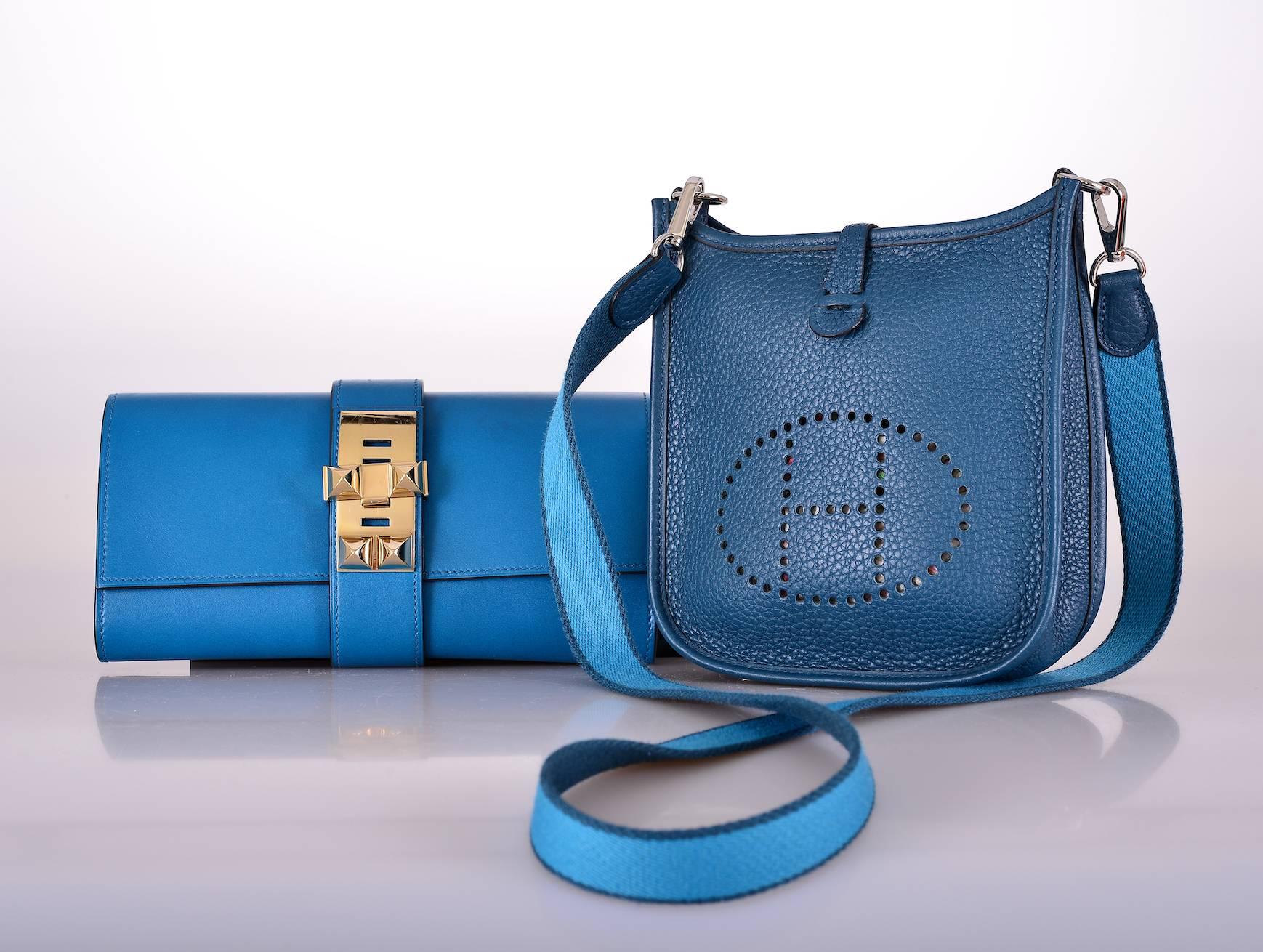 As always, another one of my fab finds! Hermes EVELYNE MINI IN GORGEOUS COLVERT BLUE /TURQUOISE & COLVERT STRAP.  Perfect cross body bag fits all the essentials: phone, wallet, lipstick, and credit card. THE LEATHER IS CLEMENCE. LOVE THE REMOVABLE