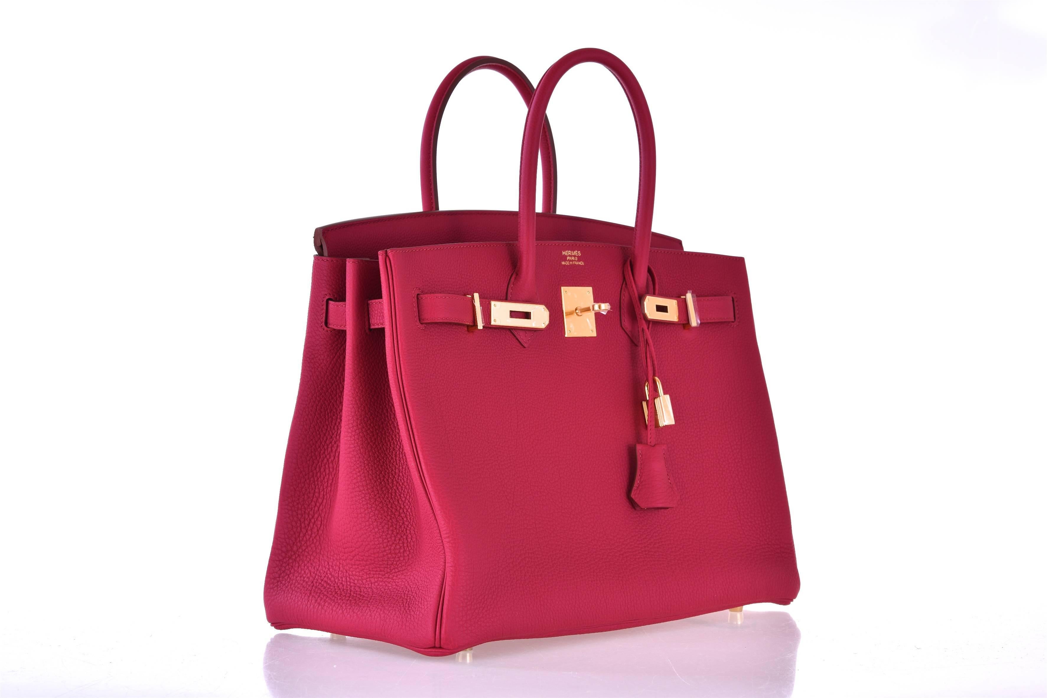 Hermes 35cm Birkin Bag Super Rare Rubis Togo leather GHW
New  Condition
Hardware: Gold
Country of Origin: France
Color: Flamingo  
Accompanied by: Care Booklet; Dust Bag Plastic Raincoat box
Closure: Clasp
Height (in inches): 9
Width (in