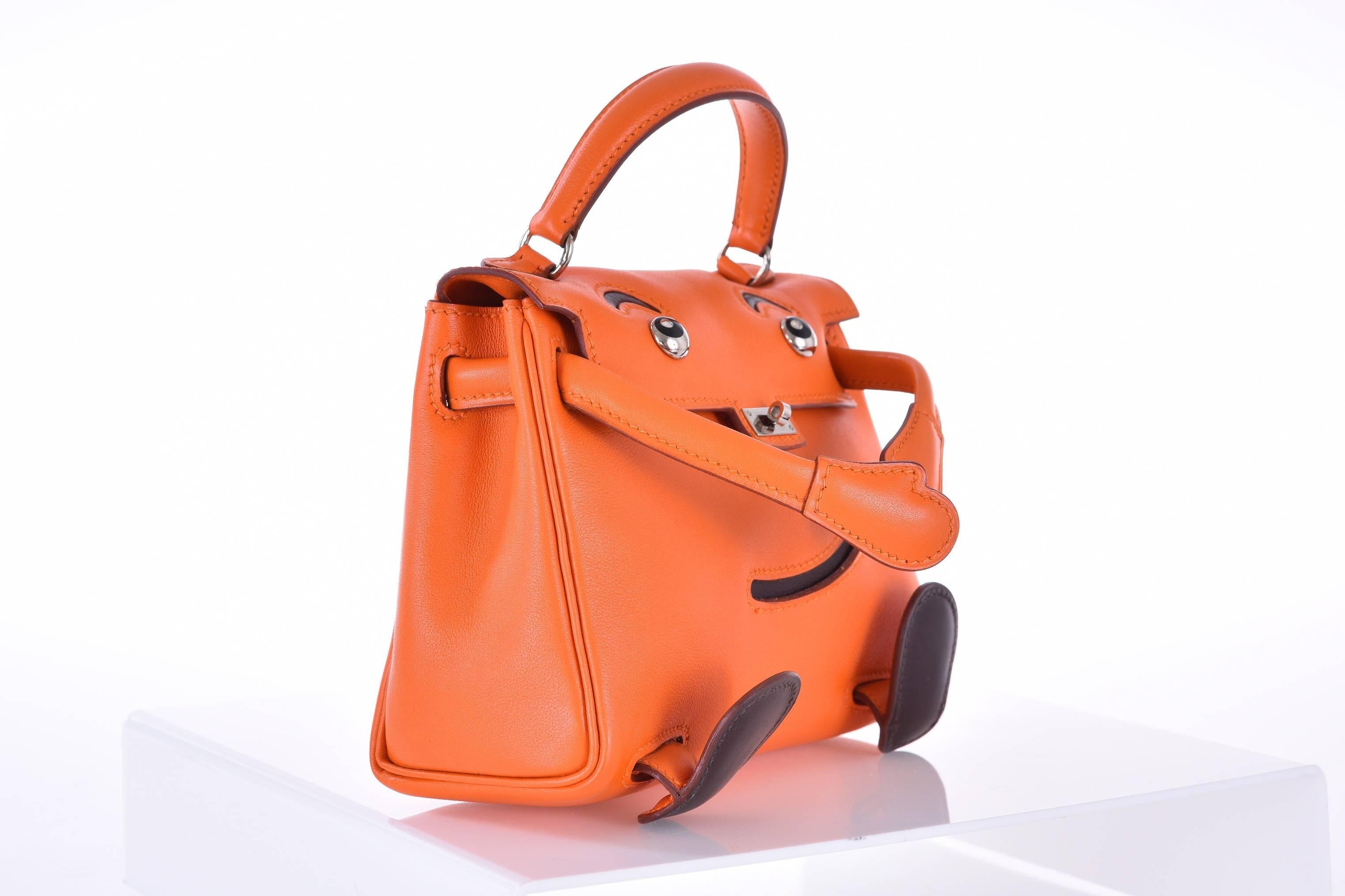 Hermes Kelly Doll Bag Orange Hermes Kelly Idole (Kelly Doll) Gulliver 

Pristine  condition 

Classic Hermes Kelly with arms, legs, and a face smiling back at you and this playful, rare design from the house of Hermes requires those who love it