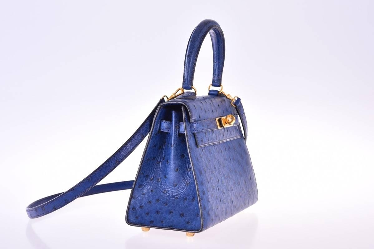 Excellent Condition 

The HERMES KELLY YOU HAVE NEVER SEEN! 20cm KELLY IN blue sapphire …with gold hardware.
This 20cm cross body Kelly bag by Hermès in ostrich leather, gold hardware, and the signature twist lock closure. .
Signature twist