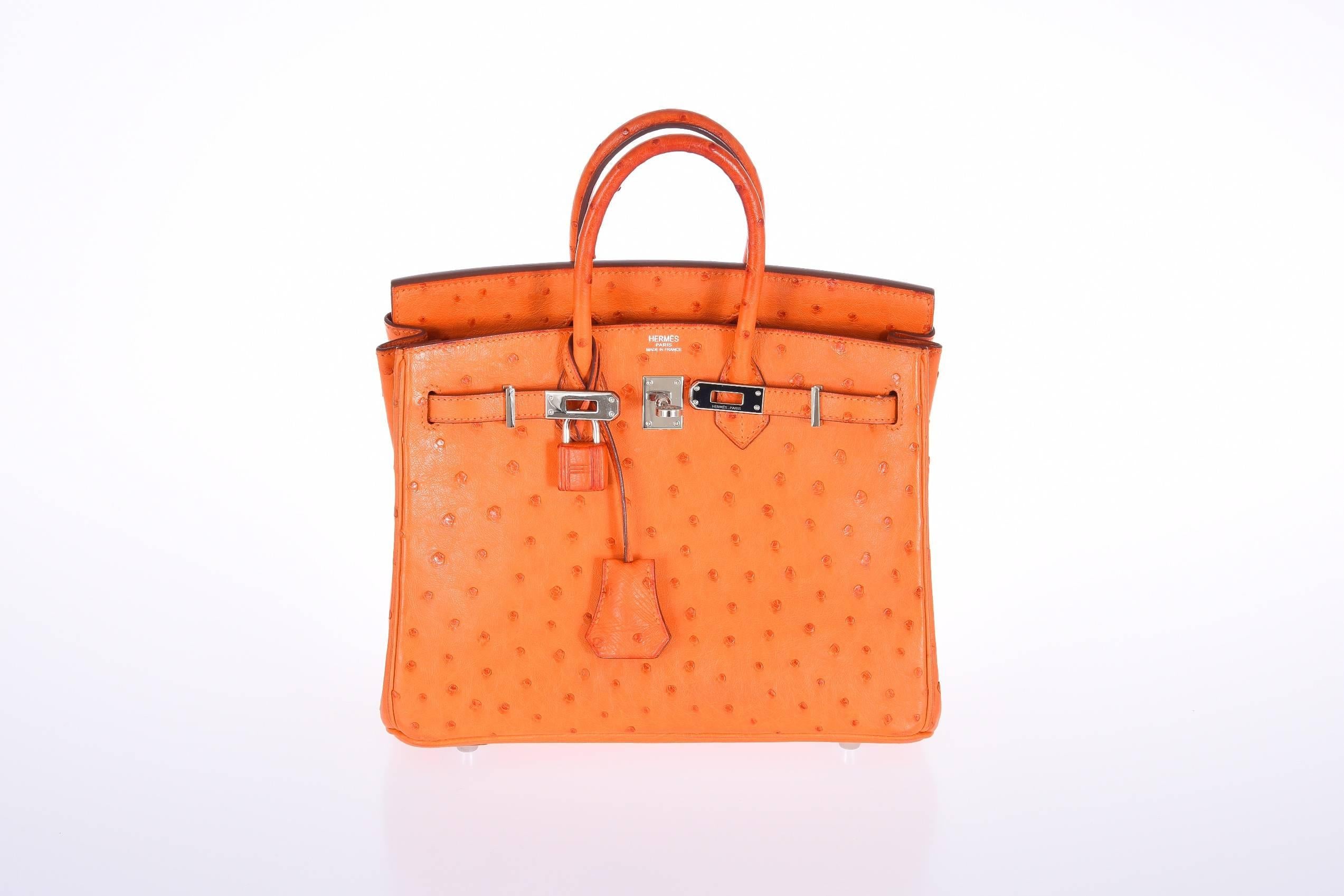 Hermes 25cm Ostrich Birkin Bag Stunning Orange with Palladium Hardware
Excellent
Hardware:Palladium
Country of Origin: France
Color: Orange
Closure: Toggle
Handle Drop (in inches): 2.75
Authenticity Details: Hermes markings
Primary Material: