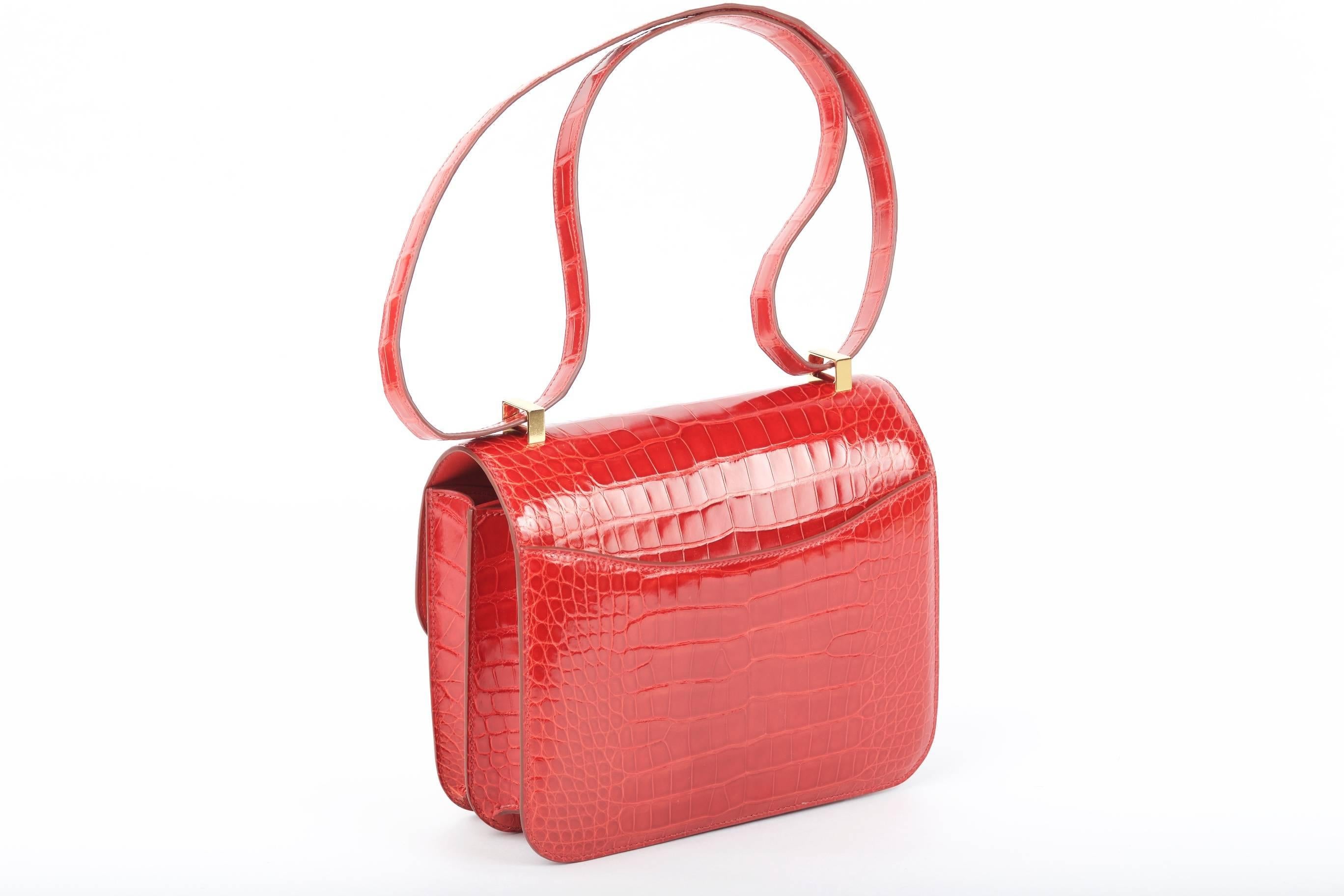 New Condition

Hermes Constance in a perfect super rare size 24cm! Incredible Sanguine nilo crocodile with Gold hardware. Actually big enough for everyday use. Comfy double strap that is perfect to carry cross body or shoulder bag. The color will