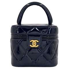 Chanel 1995 Black "Barbie" Heart Mirror Vanity Bag 24k GHW 69190