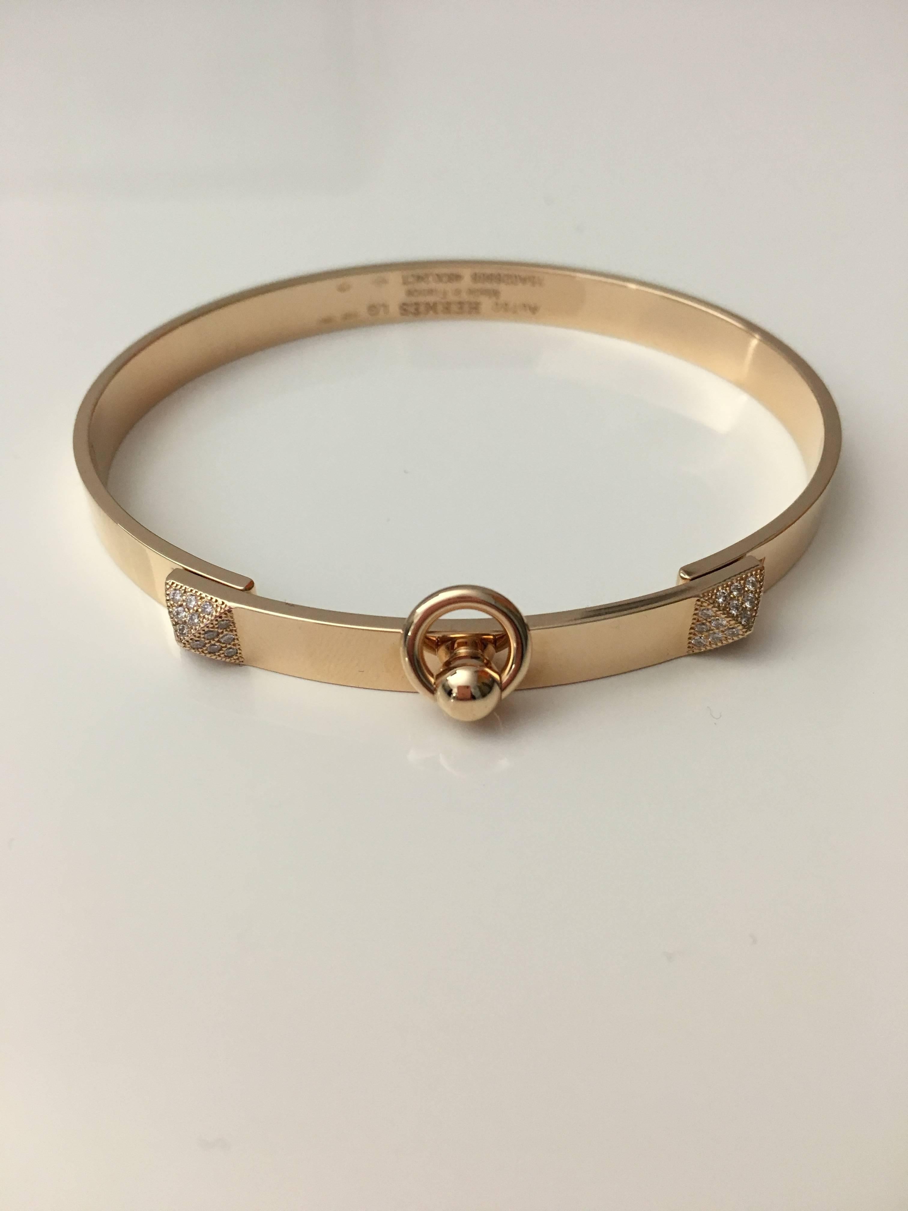 Brand new and fresh from the store
Hermes Bracelet Bangle
Collier de Chien 
Bracelet in pink Gold set with diamonds
small model
Wrist size: 14.5-15 cm
Rose gold 750/1000
