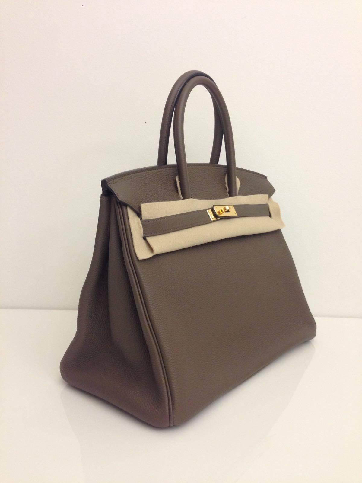 Hermes 
Birkin Size 35
Togo leather 
Colour Taupe
gold hardware 
store fresh, comes with receipt and full set (dust bag, box...) 
Hydeparkfashion specializes in sourcing and delivering authentic luxury handbags, mainly Hermes, to client around