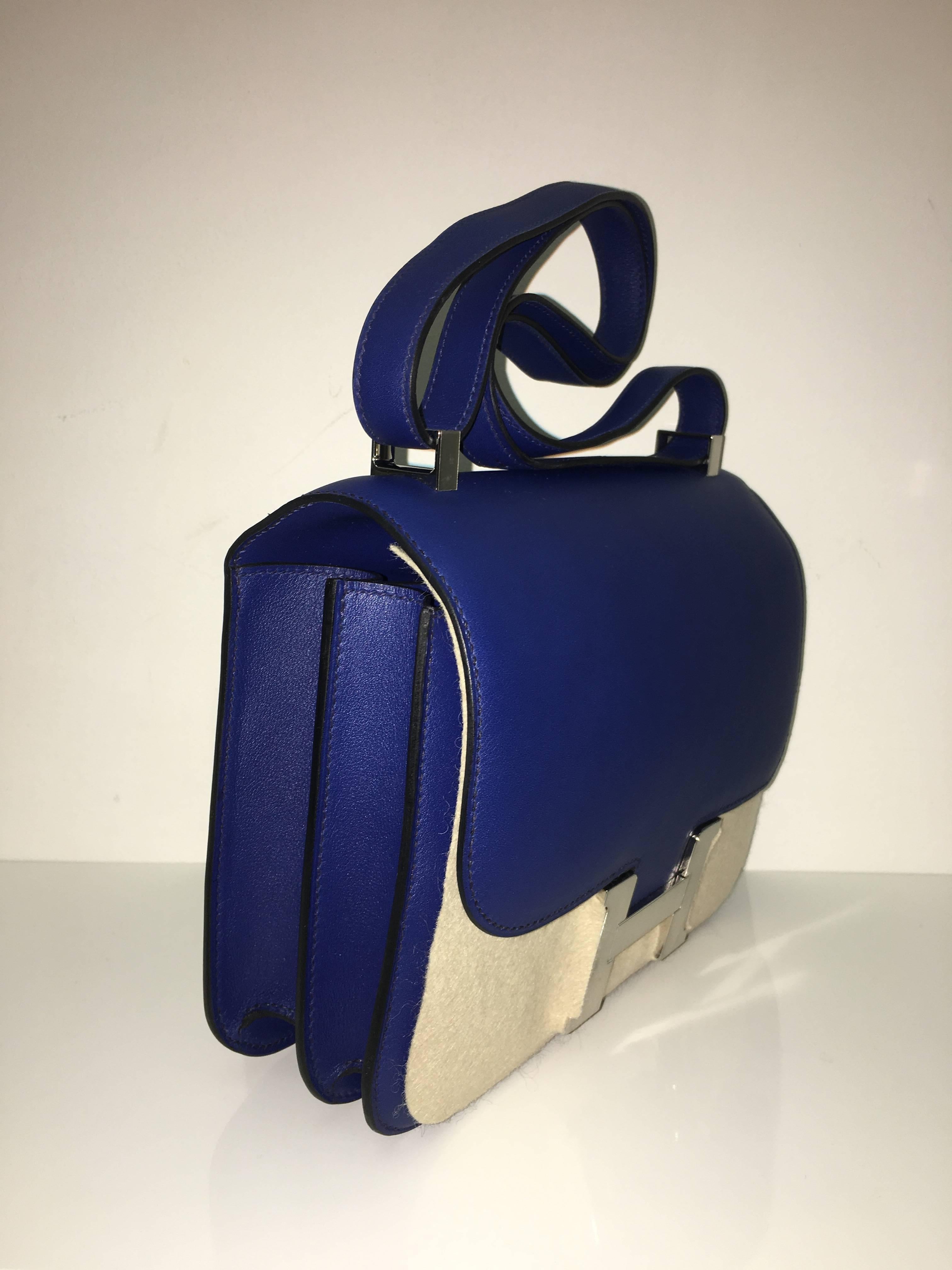 Hermes 
Constance Size 24
Swift Leather 
Colour Blue Sapphire
Palladium (silver) Hardware 
store fresh, comes with receipt and full set (dust bag, box...) 
Hydeparkfashion specializes in sourcing and delivering authentic luxury handbags,