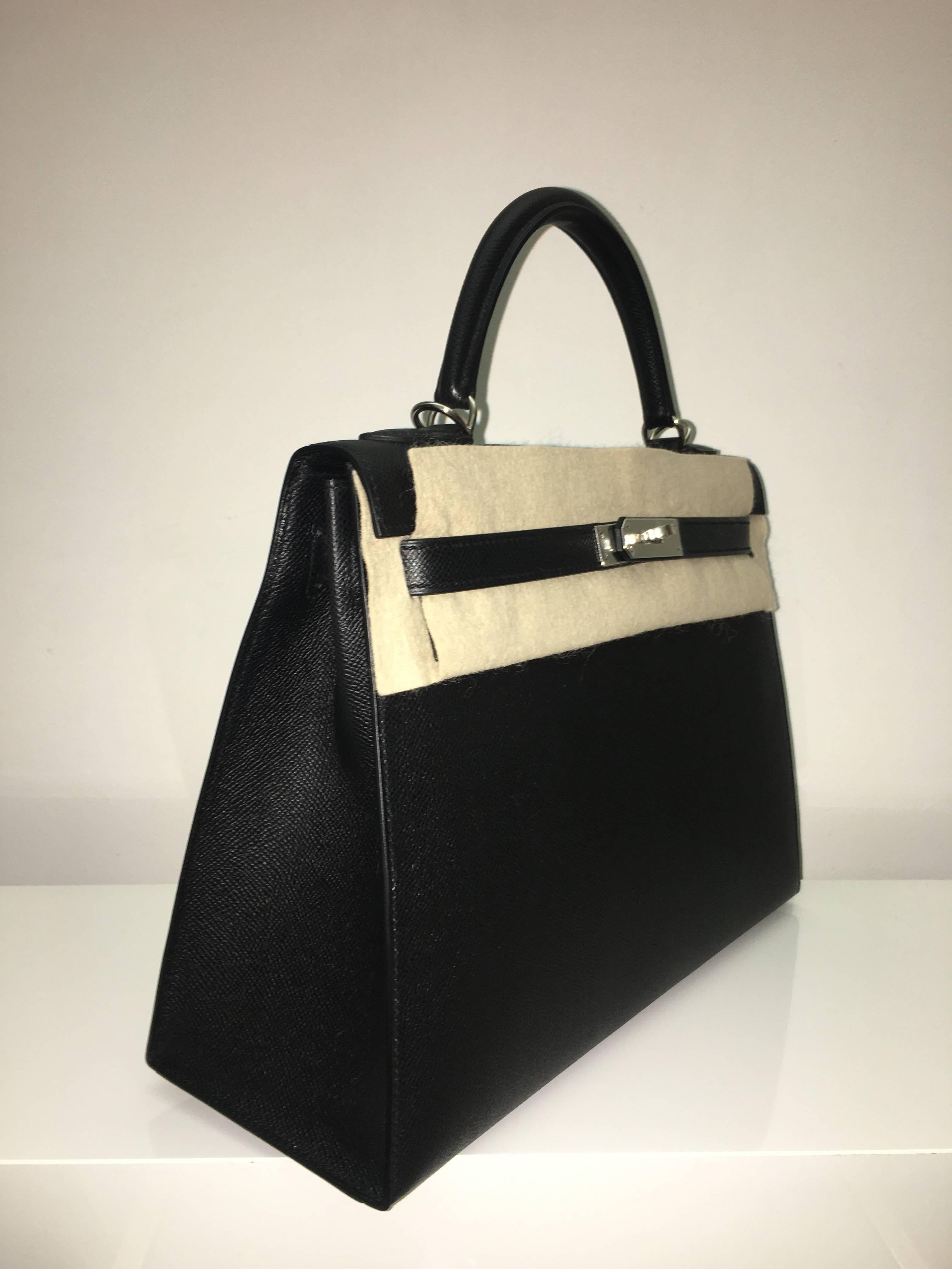 Hermes 
Kelly Size 32
epsom Leather 
Colour black
Silver (palladium) Hardware 
store fresh, comes with receipt and full set (dust bag, box...) 
Hydeparkfashion specializes in sourcing and delivering authentic luxury handbags, mainly Hermes, to