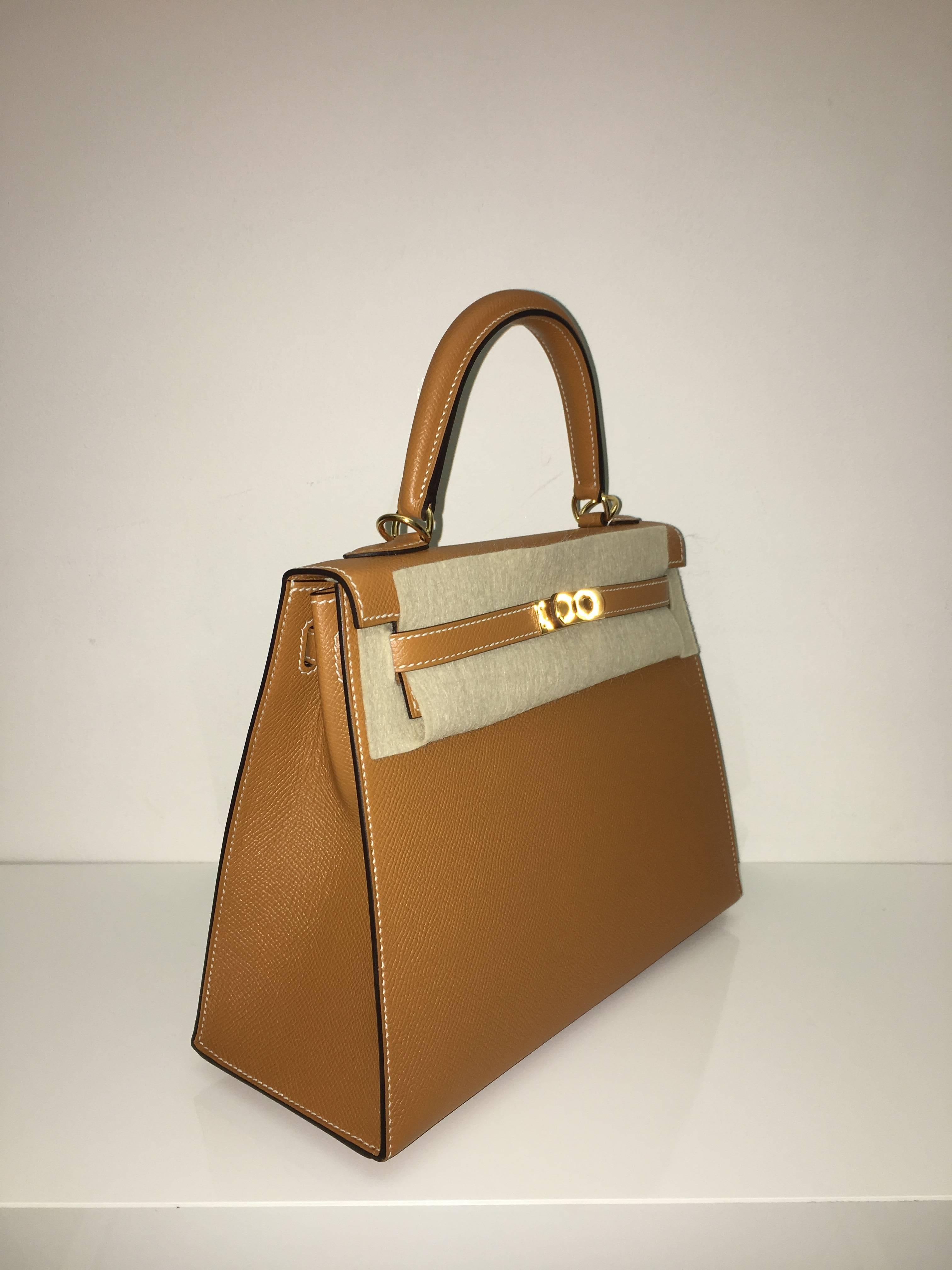 Hermes 
Kelly Size 25
Epsom Leather 
Colour Toffee
Gold Hardware 
store fresh, comes with receipt and full set (dust bag, box...) 
Hydeparkfashion specializes in sourcing and delivering authentic luxury handbags, mainly Hermes, to client