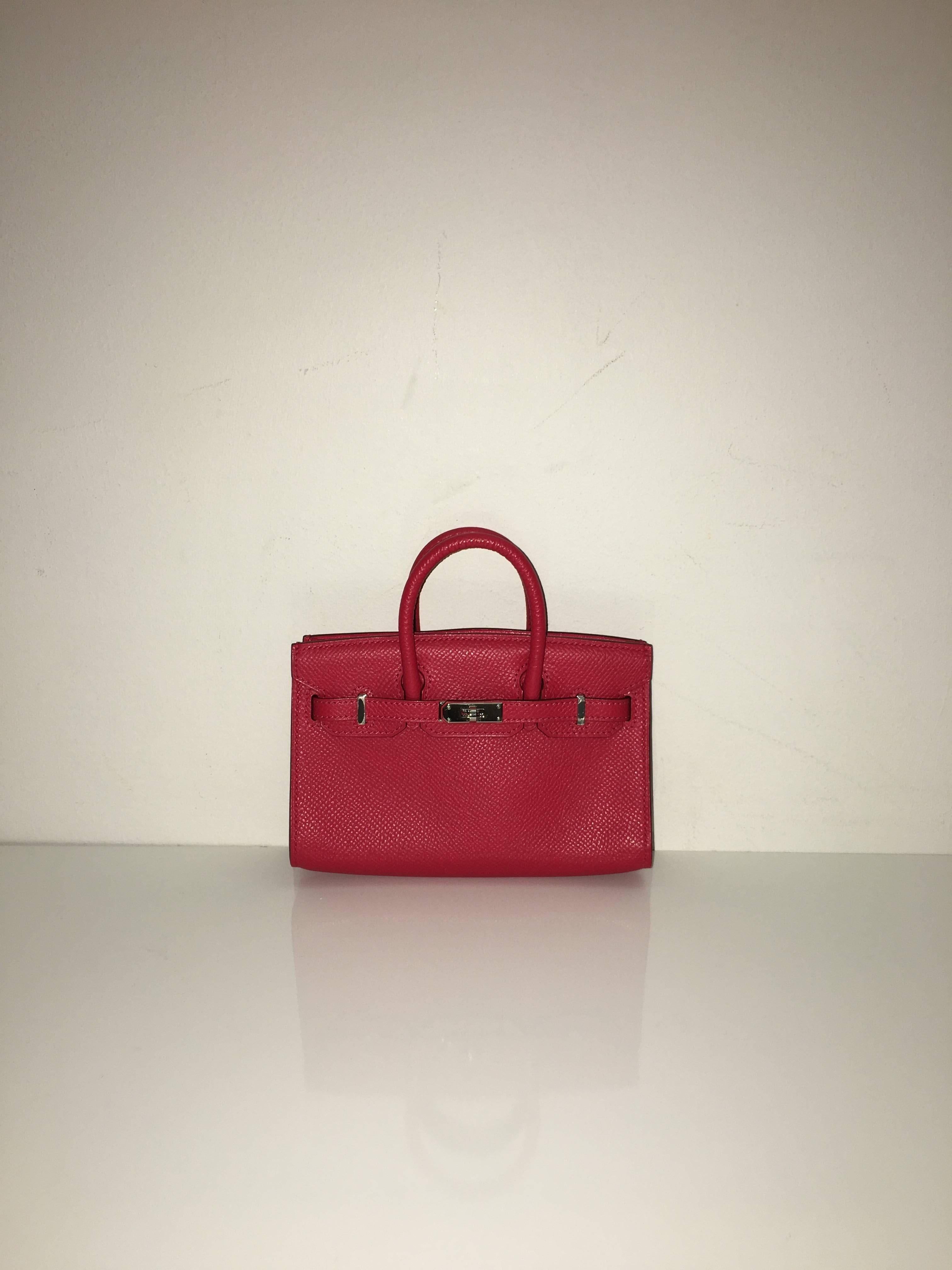 Hermes 
Tiny Birkin
Epsom Leather 
Colour Bouga Invillier
Silver (Palladium) Hardware 
store fresh, comes with receipt and full set (dust bag, box...) 
Hydeparkfashion specializes in sourcing and delivering authentic luxury handbags, mainly