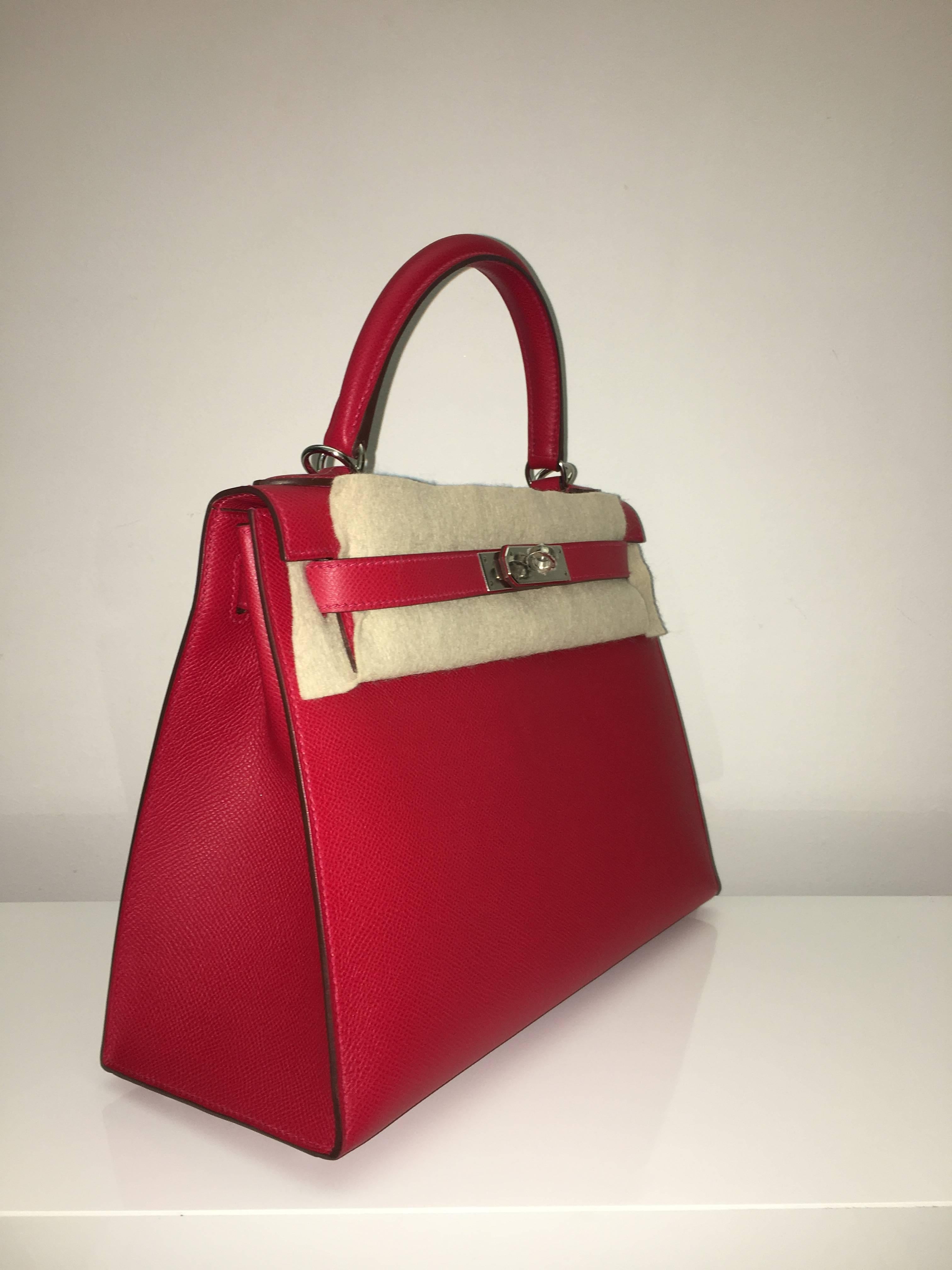 Hermes 
Kelly Size 28
Epsom Leather 
Color Rouge Casak
Palladium (Silver) Hardware 
store fresh, comes with receipt and full set (dust bag, box...) 
Hydeparkfashion specializes in sourcing and delivering authentic luxury handbags, mainly