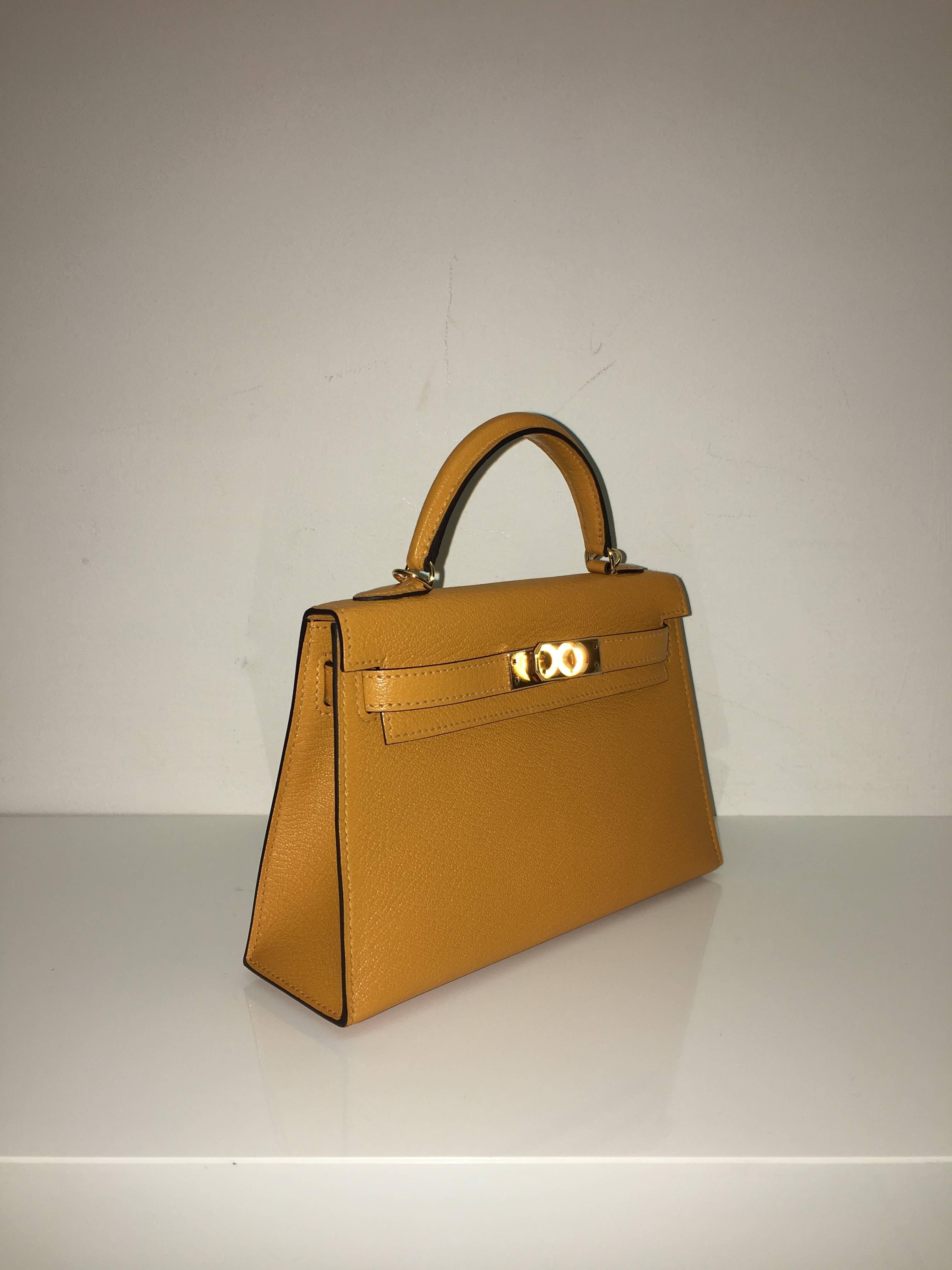 Hermes 
Kelly Size 20
Chevre Leather 
Colour Mustard
Gold Hardware 
store fresh, comes with receipt and full set (dust bag, box...) 
Hydeparkfashion specializes in sourcing and delivering authentic luxury handbags, mainly Hermes, to client
