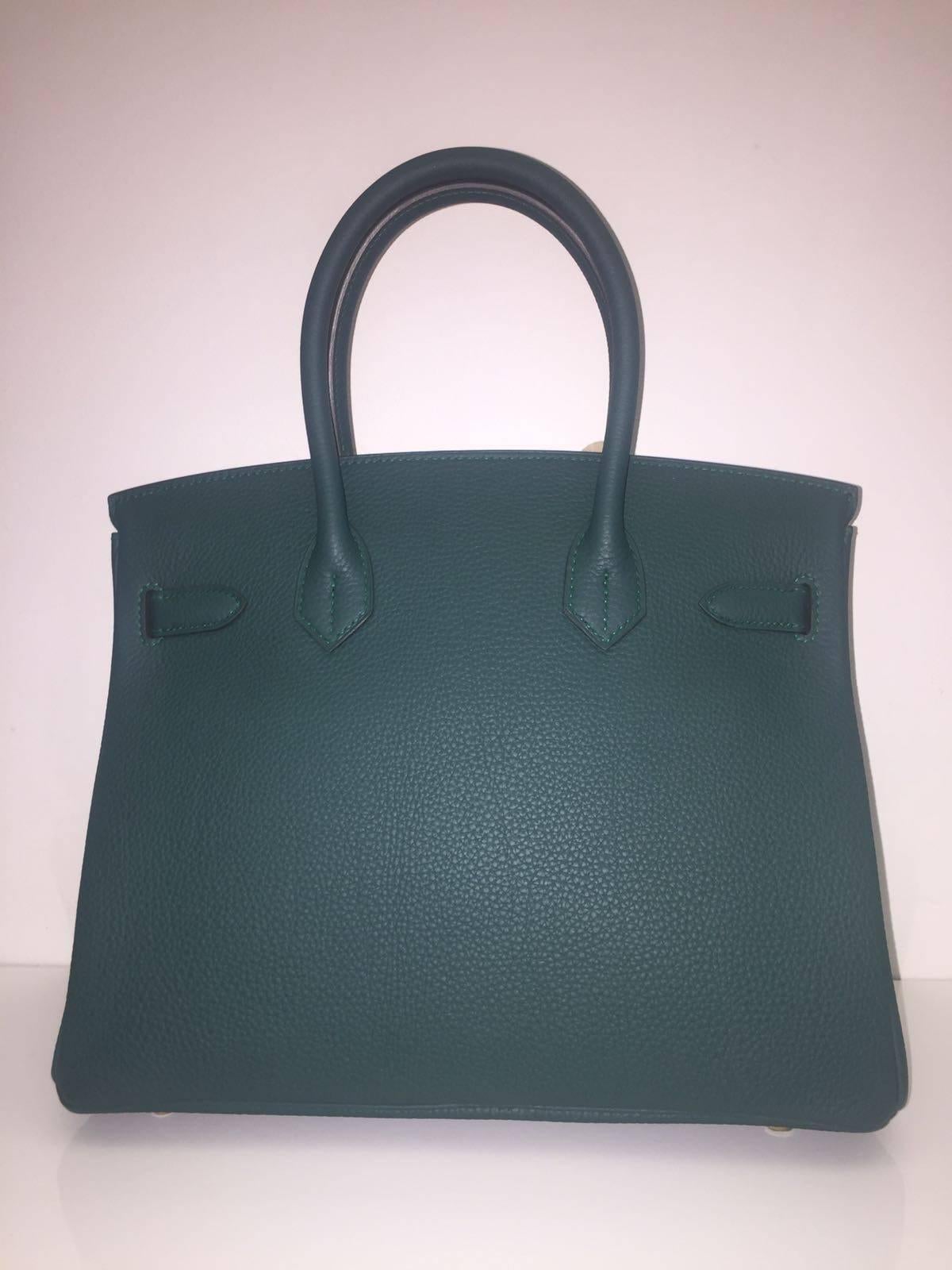 Hermes 
Birkin Size 30
Togo Leather 
Colour Green Malachite
Gold Hardware
store fresh, comes with receipt and full set (dust bag, box...) 
Hydeparkfashion specializes in sourcing and delivering authentic luxury handbags, mainly Hermes, to client