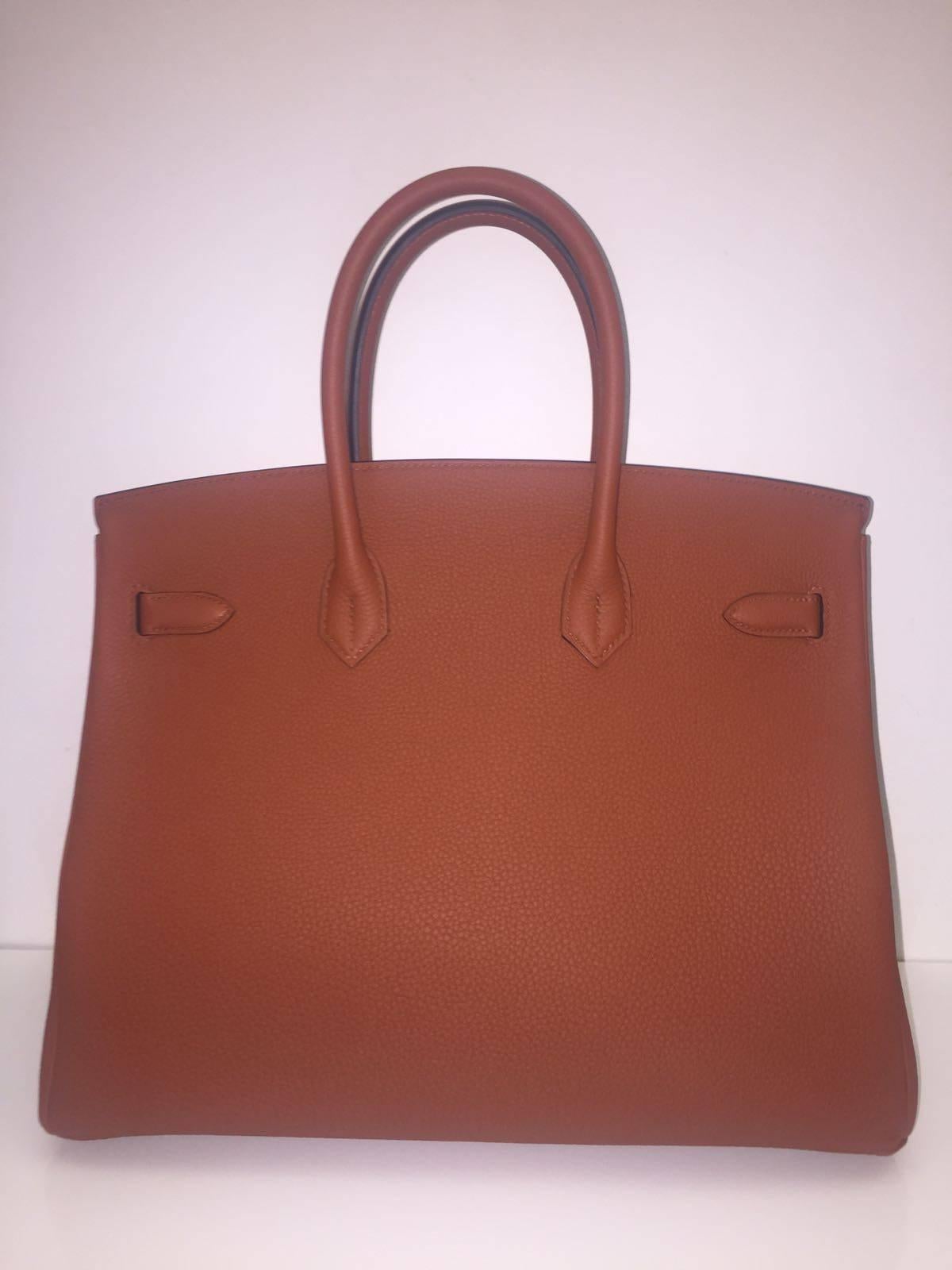 Hermes 
Birkin Size 35
Togo Leather 
Colour Cuivre
Gold Hardware
store fresh, comes with receipt and full set (dust bag, box...) 
Hydeparkfashion specializes in sourcing and delivering authentic luxury handbags, mainly Hermes, to client around the