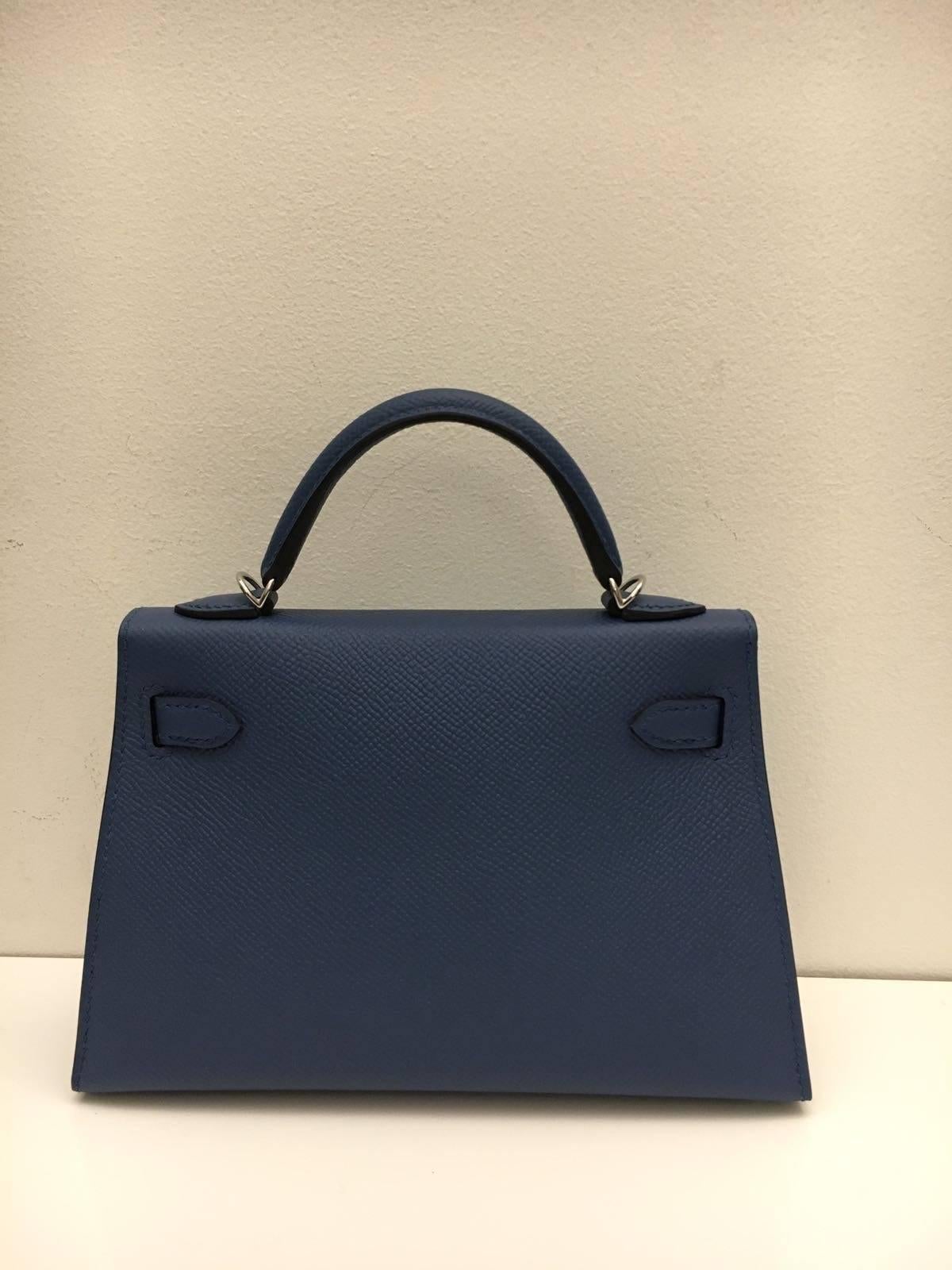 Hermes 
Kelly Size 20
Epsom Leather 
Colour Blue Agate
Silver Hardware
Store fresh, comes with receipt and full set (dust bag, box...) 
Hydeparkfashion specializes in sourcing and delivering authentic luxury handbags, mainly Hermes, to clients