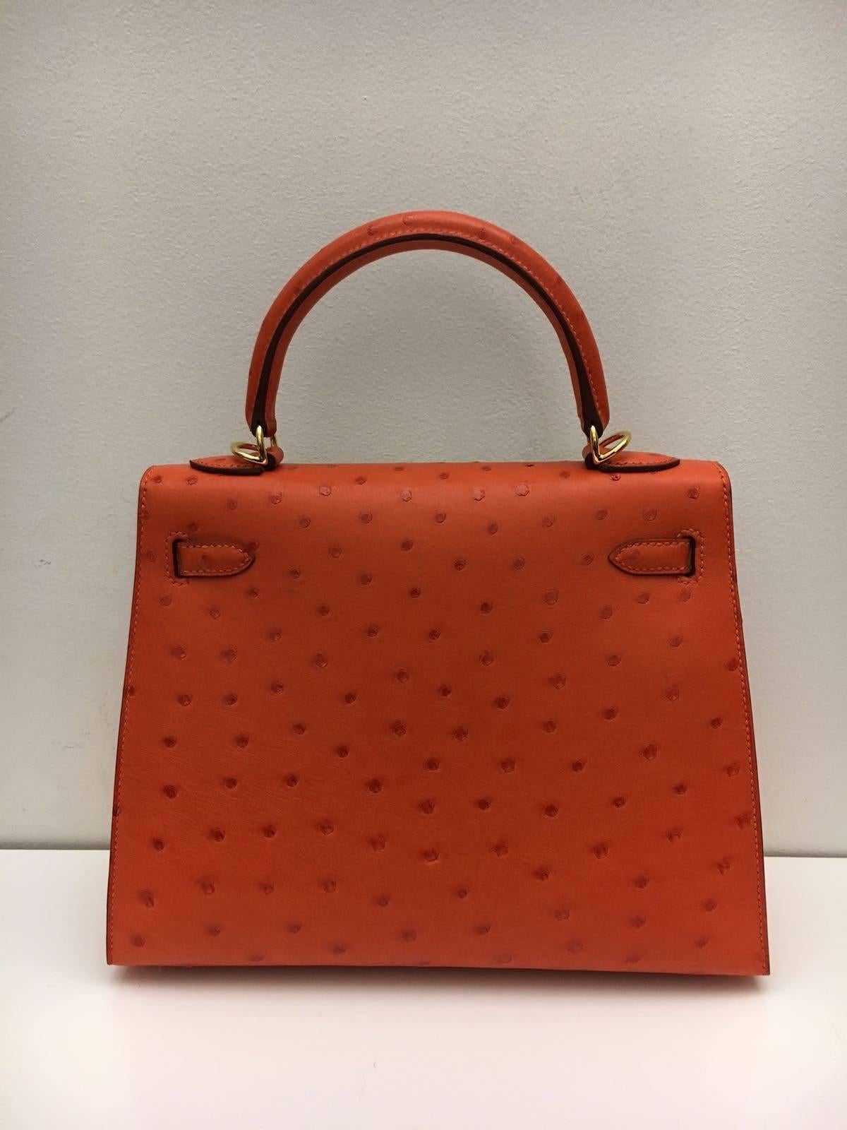 BRAND NEW Kelly 25 Tangerine Ostrich GHW For Sale 1