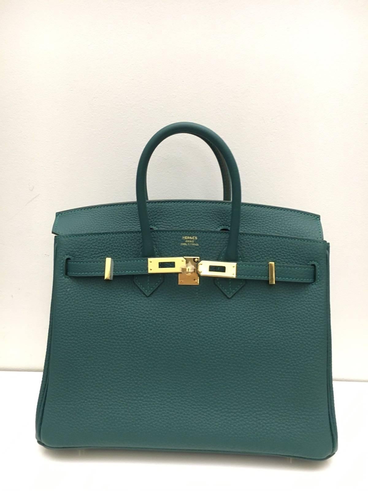 Hermes 
Birkin Size 25
Togo Leather 
Colour Green Malachite
Gold Hardware
Store fresh, comes with receipt and full set (dust bag, box...) 
Hydeparkfashion specializes in sourcing and delivering authentic luxury handbags, mainly Hermes, to clients